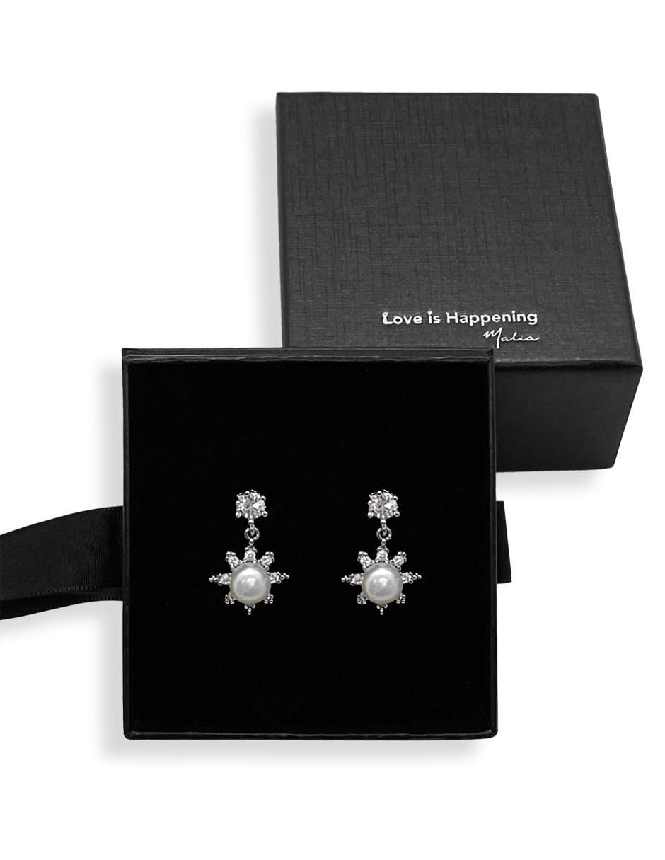 Aretes de estrella con acabado baño de rodio