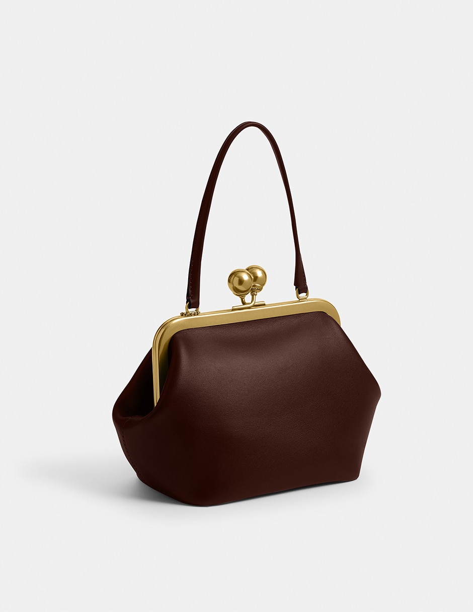 Bolsa clutch Kisslock de piel para mujer 4